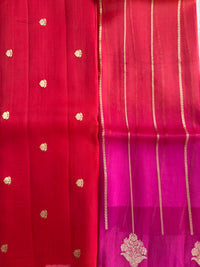 Red and pink fabric with gold patterns